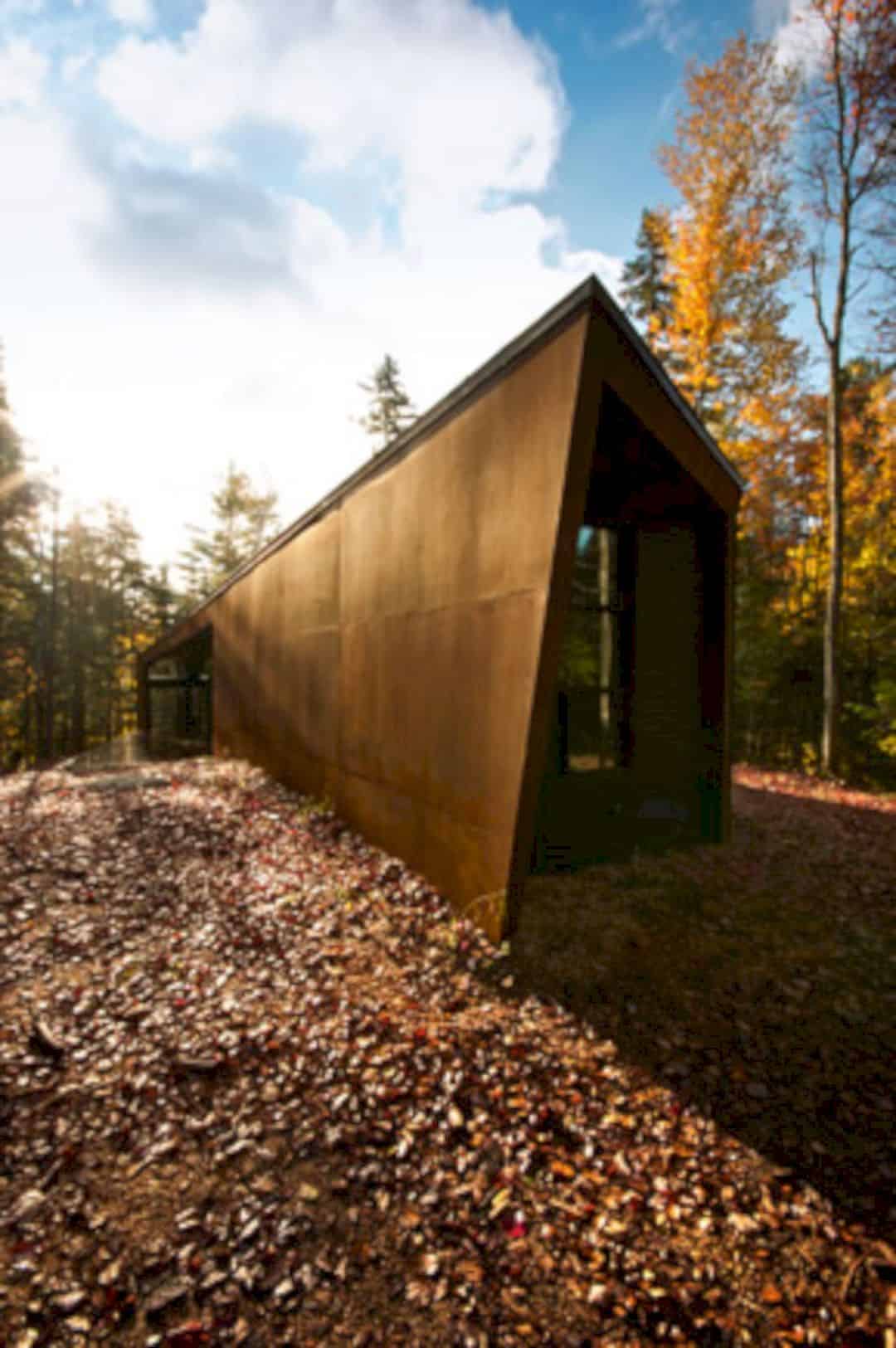 Geometry In Black A Three Block Black Building In Quebecs Dense Forest 8