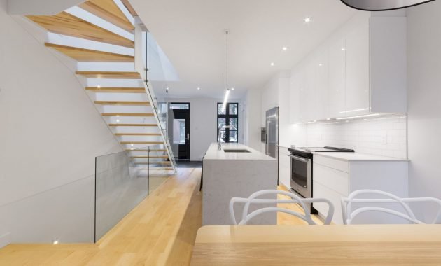 Chambord Houses: A Conversion of Four Units into Two Modern Townhouses