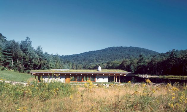 Tennis House: A Small Guesthouse and Tennis Court with A Deep Roof and ...