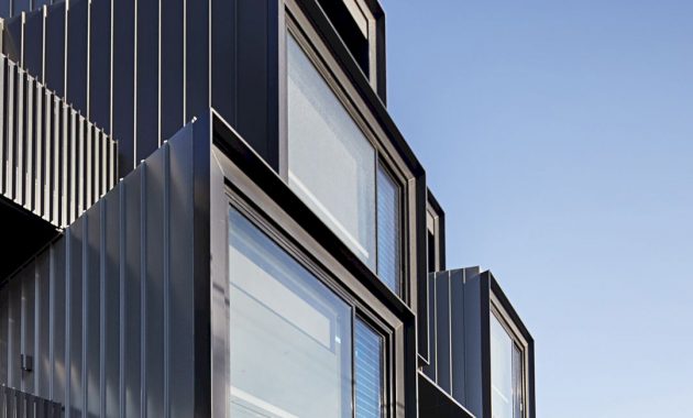 Avenir: A New Building with Interesting Bay Windows and Deep Blue ...