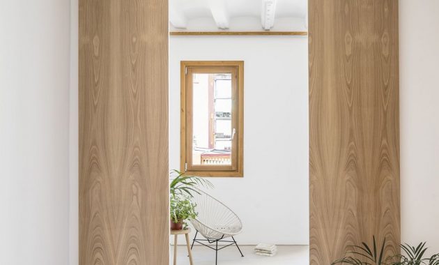 Sant Antoni Lofts: An 1880’s Apartment Conversion with A System of ...