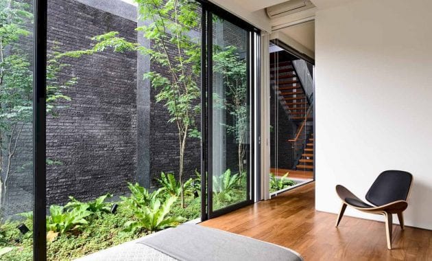 The Space Between Walls: A Semi-Detached House with Courtyard Spaces