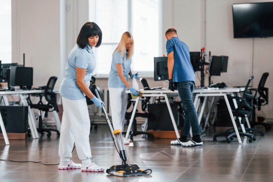 Woman Uses Vacuum Cleaner Group Of Workers Clean 2023 11 27 05 03 49 Utc