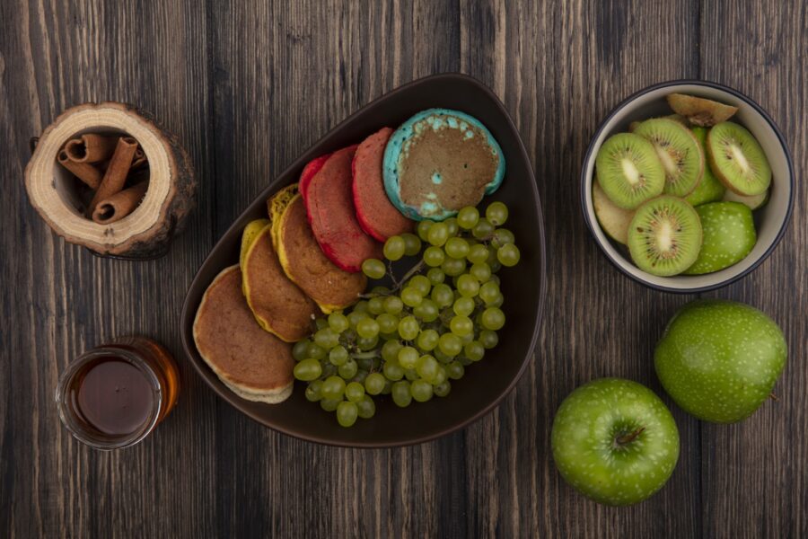 Top View Green Grapes With Pancakes In A Bowl And 2023 11 27 05 07 56 Utc