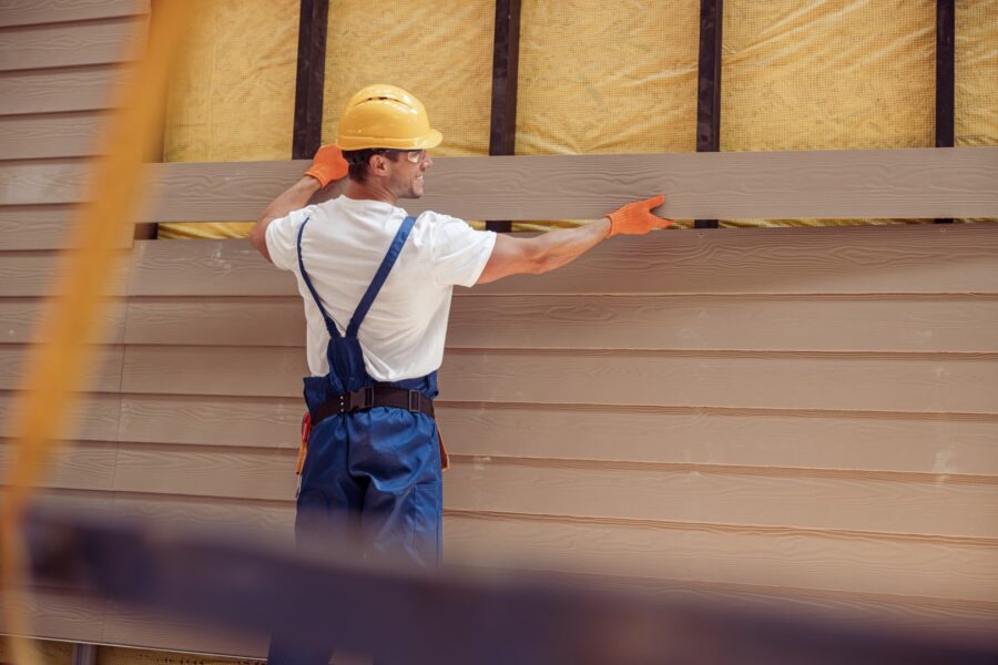 Smiling Male Worker Building Cabin At Construction 2023 11 27 04 52 36 Utc