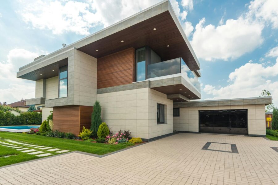 brown and white wooden house under blue sky