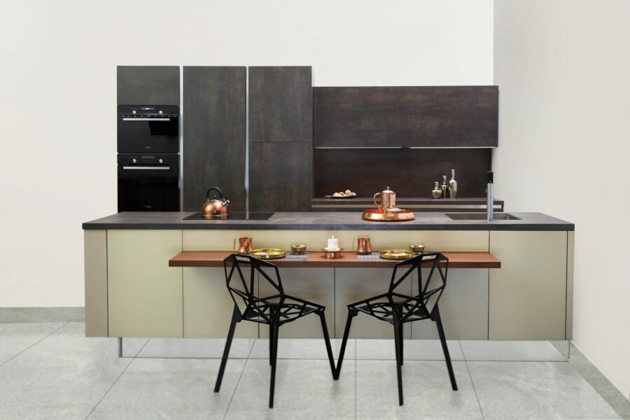 Elegant modern kitchen featuring copper accents and minimalist design.